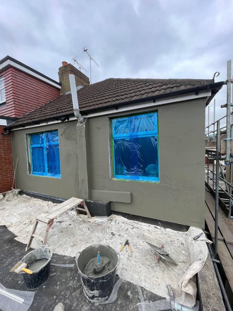 Base coat of render applied